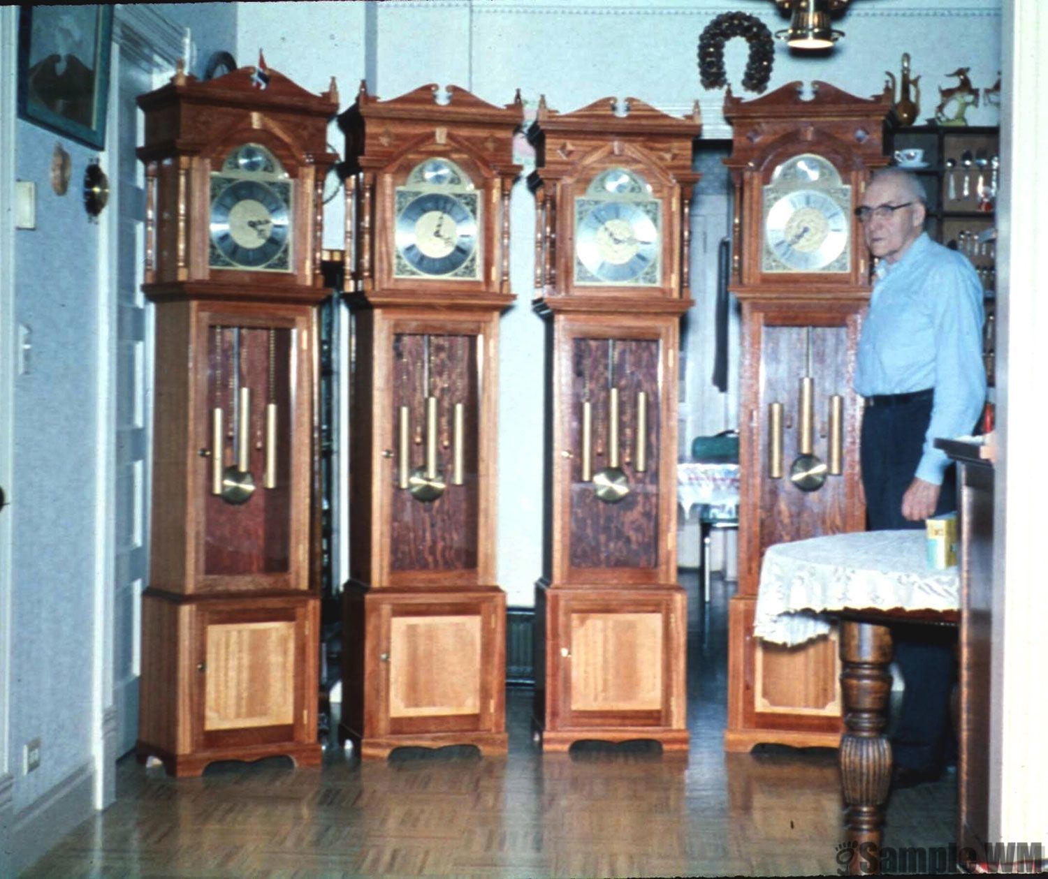 John and the 4 Grandfather clocks he built
